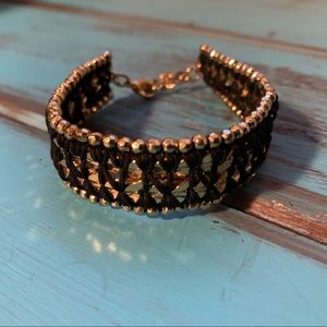 Gold and black cuff bracelet
